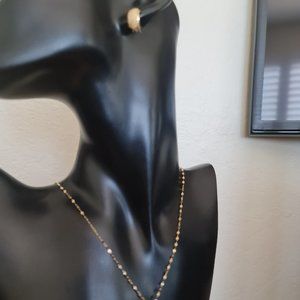 Set of earrings and pendant